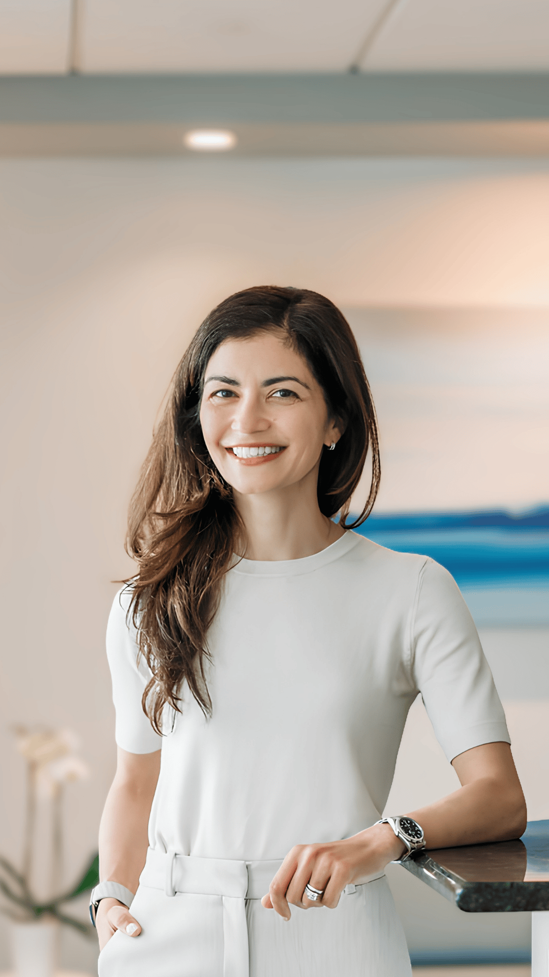 A Hingham Dentistry patient smiling in the practice's Hingham, MA office